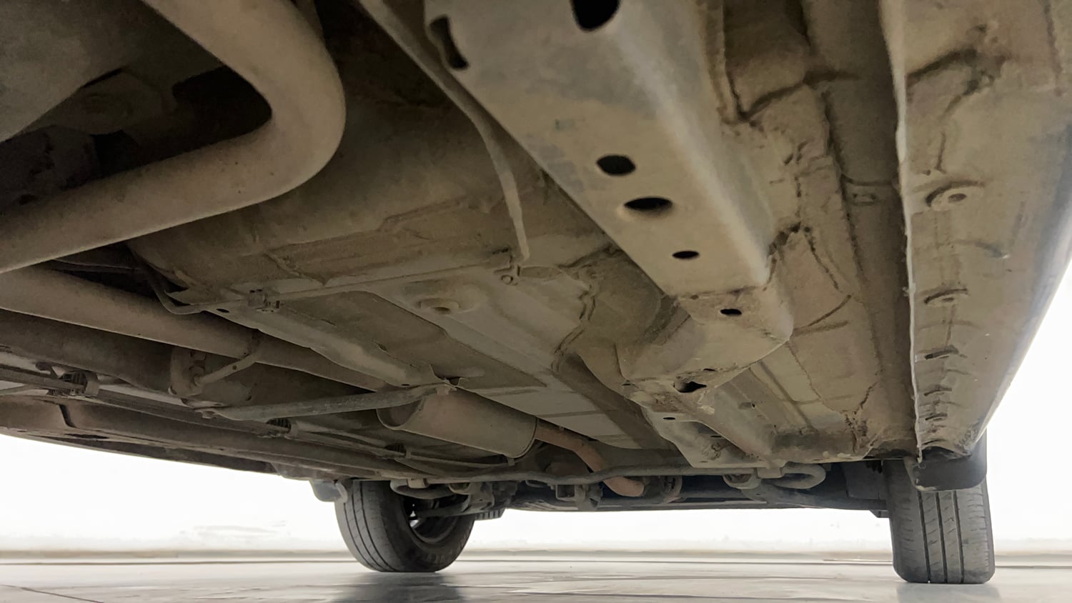 Used 2023 Tata Tigor XZ Plus CNG Cng Manual extra REAR RIGHT UNDERBODY VIEW