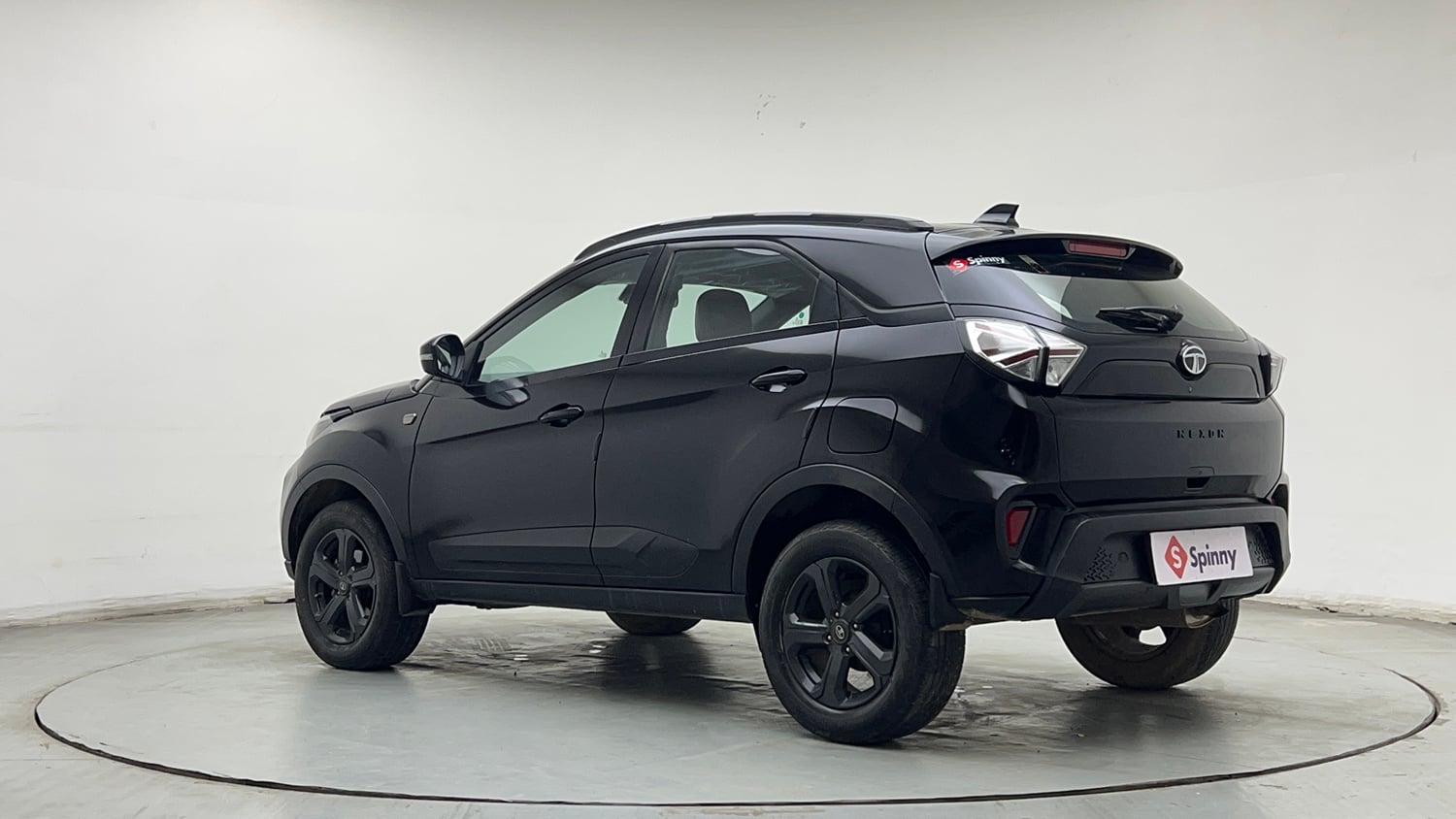 Used 2023 Tata Nexon XZ Plus (S) Dark Edition Petrol Manual exterior LEFT REAR CORNER VIEW