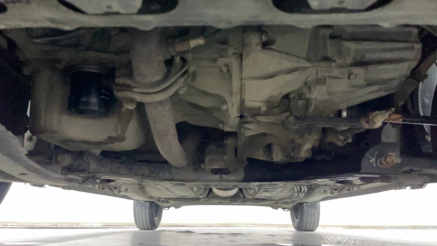 Used 2020 Maruti Suzuki Baleno Delta Petrol Manual extra FRONT LEFT UNDERBODY VIEW