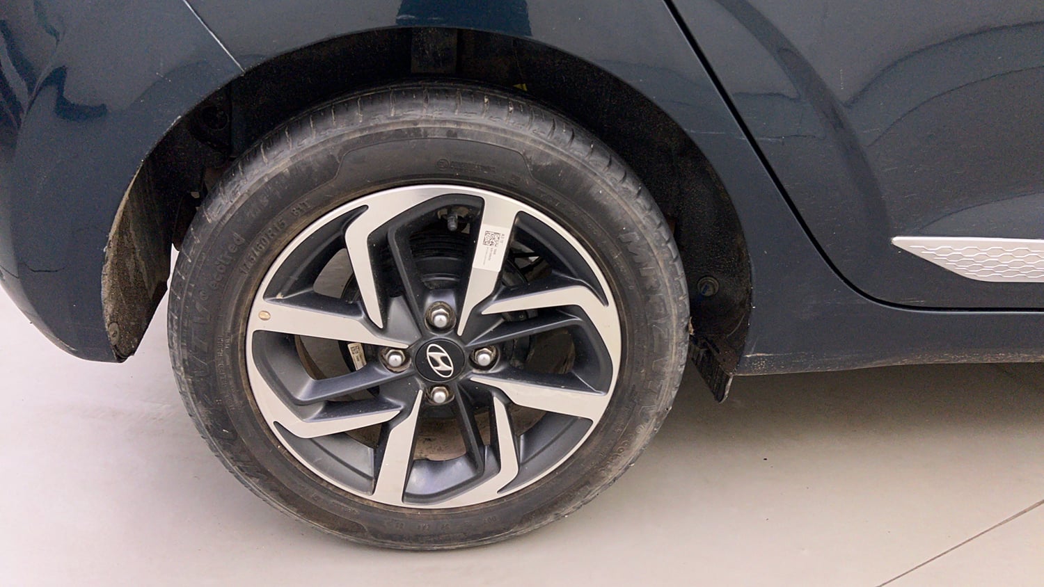 Used 2021 Hyundai Grand i10 Nios Sportz 1.2 Kappa VTVT Dual Tone Petrol Manual tyres RIGHT REAR TYRE RIM VIEW