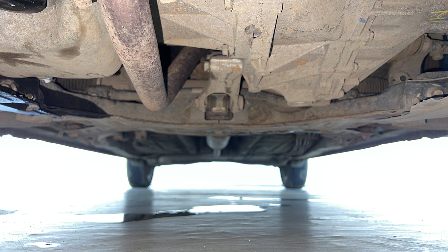 Used 2023 Maruti Suzuki Ertiga ZXi (O) CNG Cng Manual extra FRONT LEFT UNDERBODY VIEW