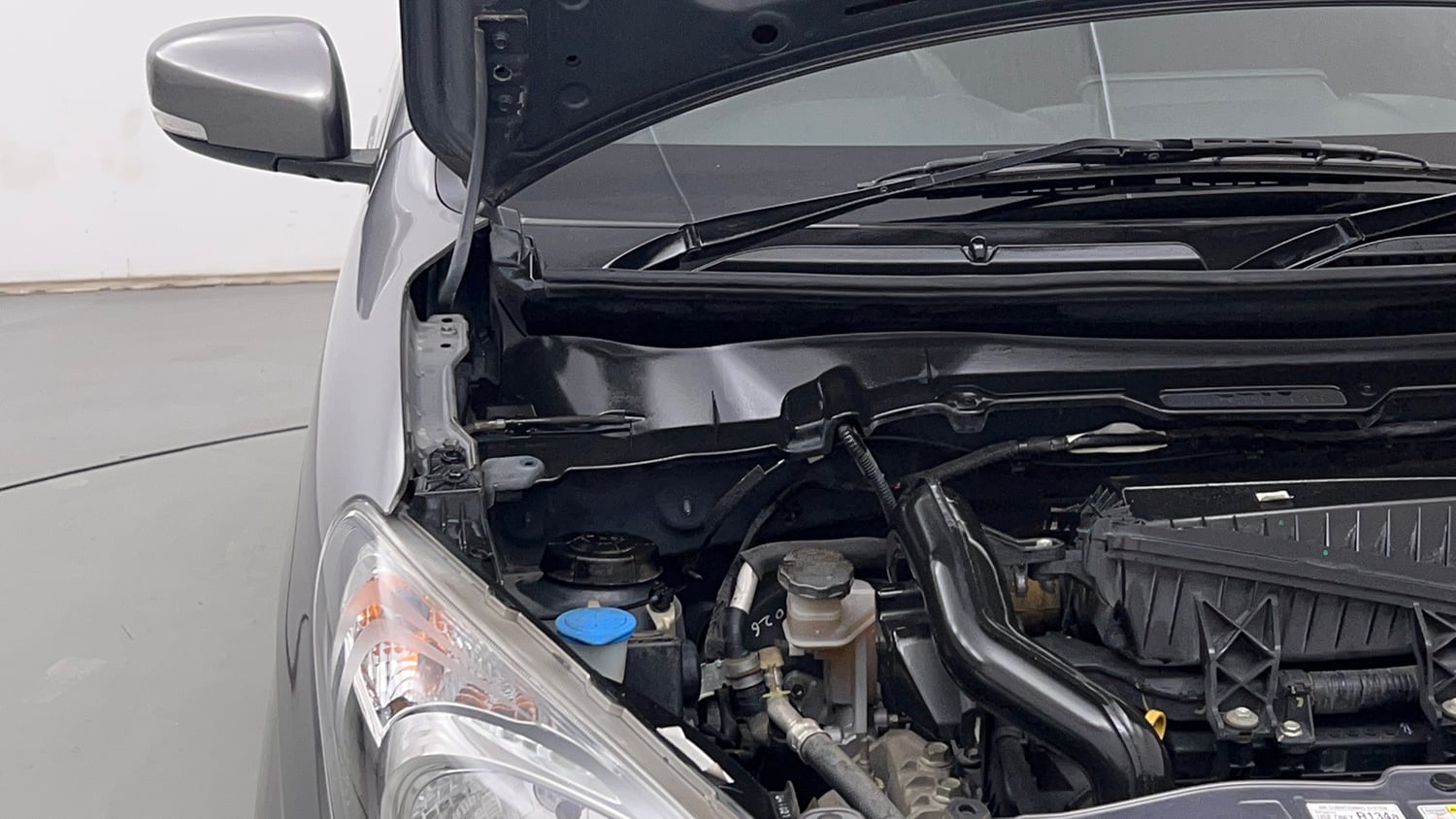 Used 2022 Maruti Suzuki Celerio ZXi Petrol Manual engine ENGINE RIGHT SIDE HINGE & APRON VIEW