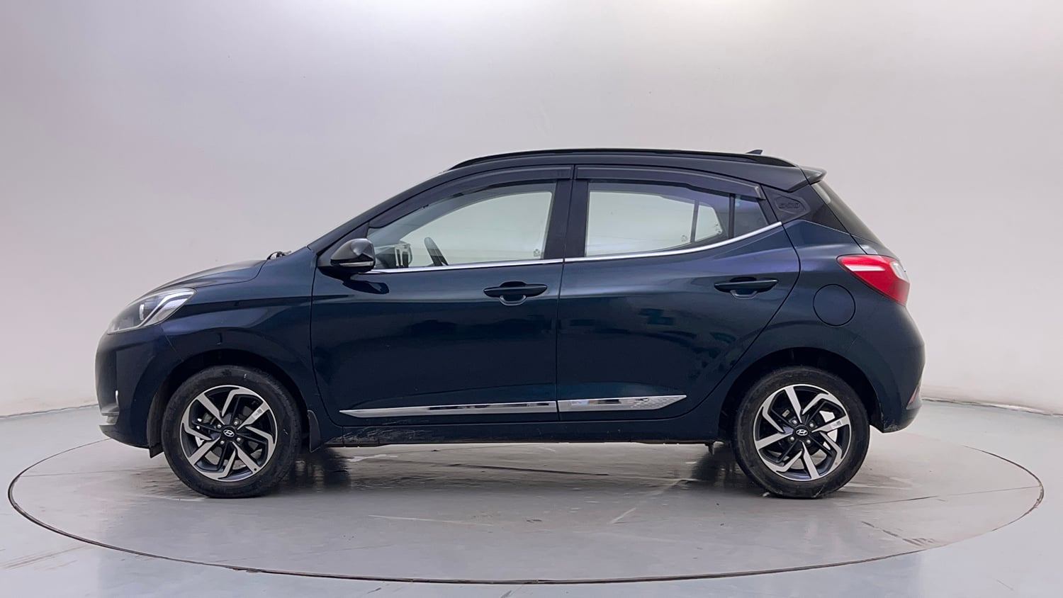 Used 2021 Hyundai Grand i10 Nios Sportz 1.2 Kappa VTVT Dual Tone Petrol Manual exterior LEFT SIDE VIEW