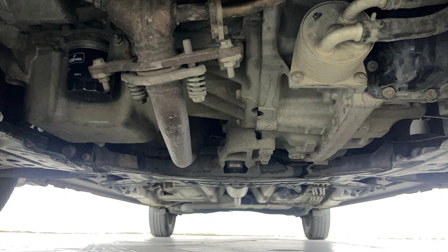 Used 2023 Maruti Suzuki Ertiga ZXi Plus AT Petrol Automatic extra FRONT LEFT UNDERBODY VIEW