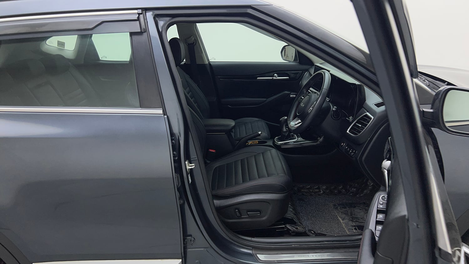 Used 2023 Kia Seltos GTX Plus 1.4 Petrol Manual interior RIGHT SIDE FRONT DOOR CABIN VIEW