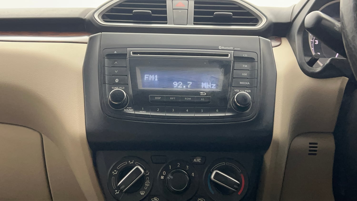 Used 2018 Maruti Suzuki Dzire VXi Petrol Manual top_features Integrated (in-dash) music system