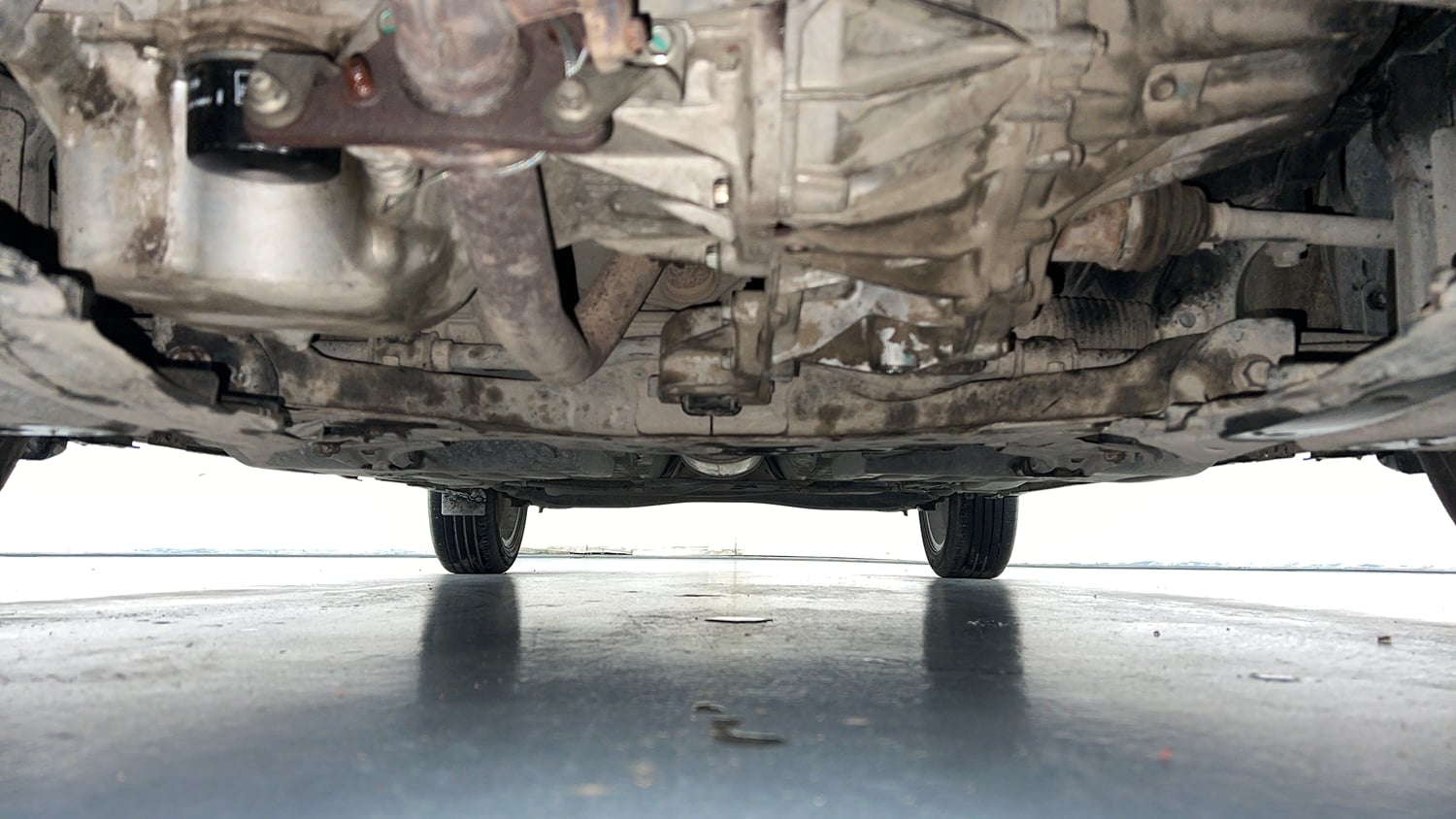 Used 2022 Maruti Suzuki Baleno Zeta MT Petrol Manual extra FRONT LEFT UNDERBODY VIEW