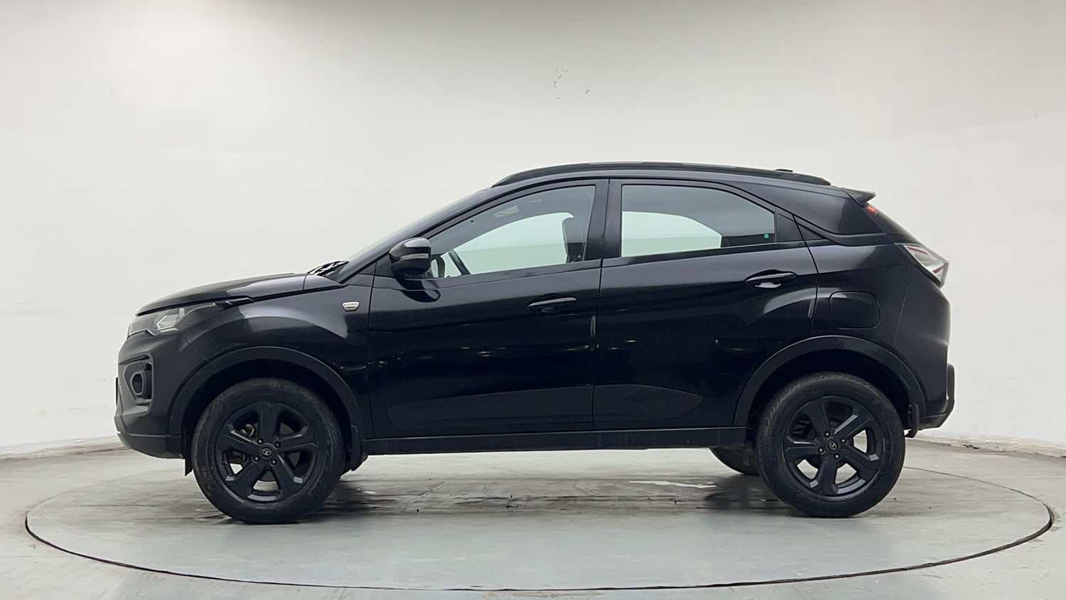 Used 2023 Tata Nexon XZ Plus (S) Dark Edition Petrol Manual exterior LEFT SIDE VIEW