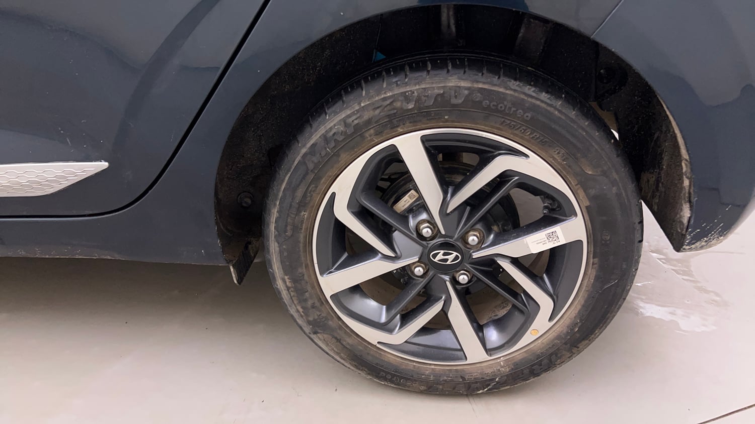 Used 2021 Hyundai Grand i10 Nios Sportz 1.2 Kappa VTVT Dual Tone Petrol Manual tyres LEFT REAR TYRE RIM VIEW