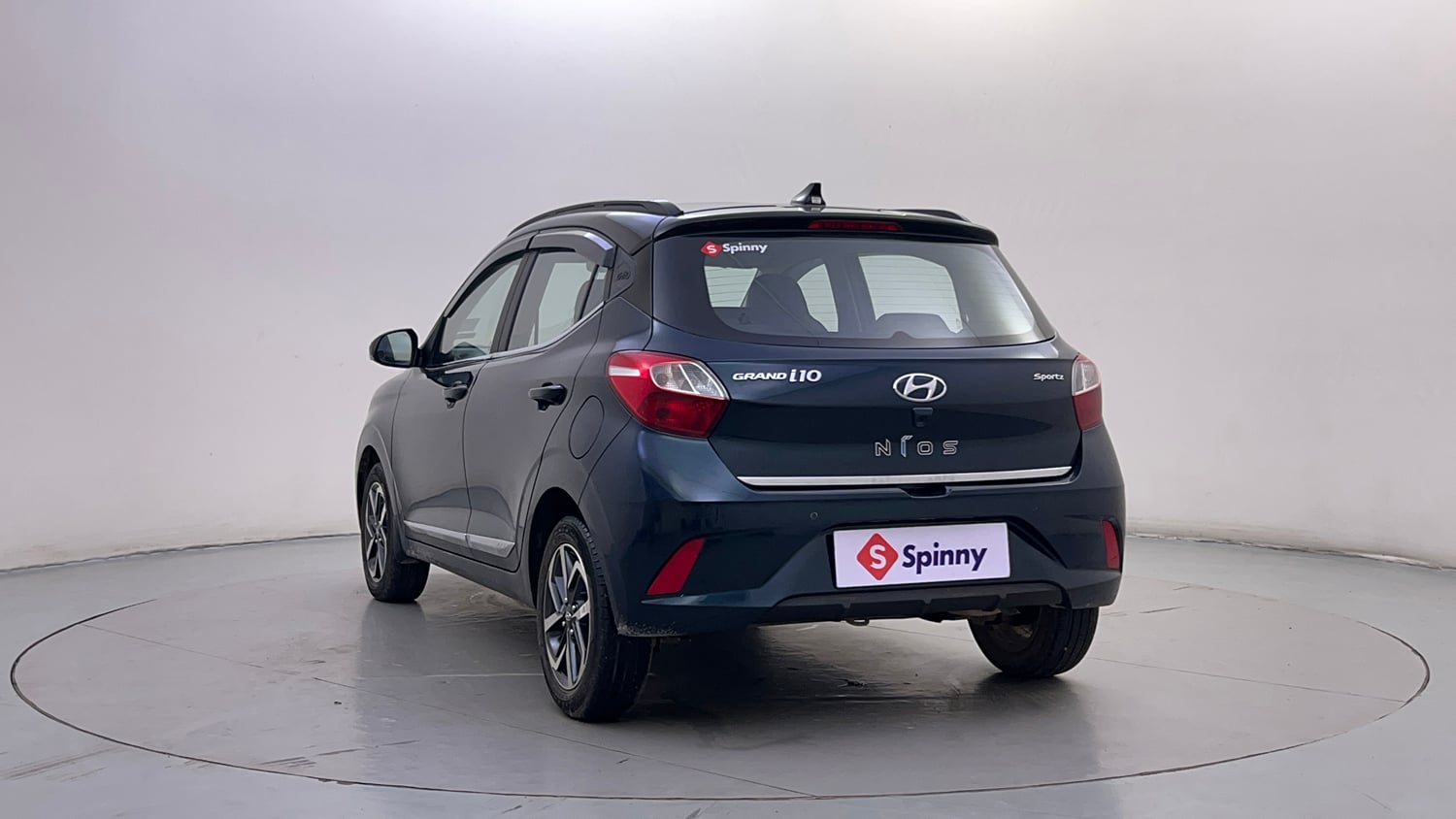 Used 2021 Hyundai Grand i10 Nios Sportz 1.2 Kappa VTVT Dual Tone Petrol Manual exterior LEFT REAR CORNER VIEW