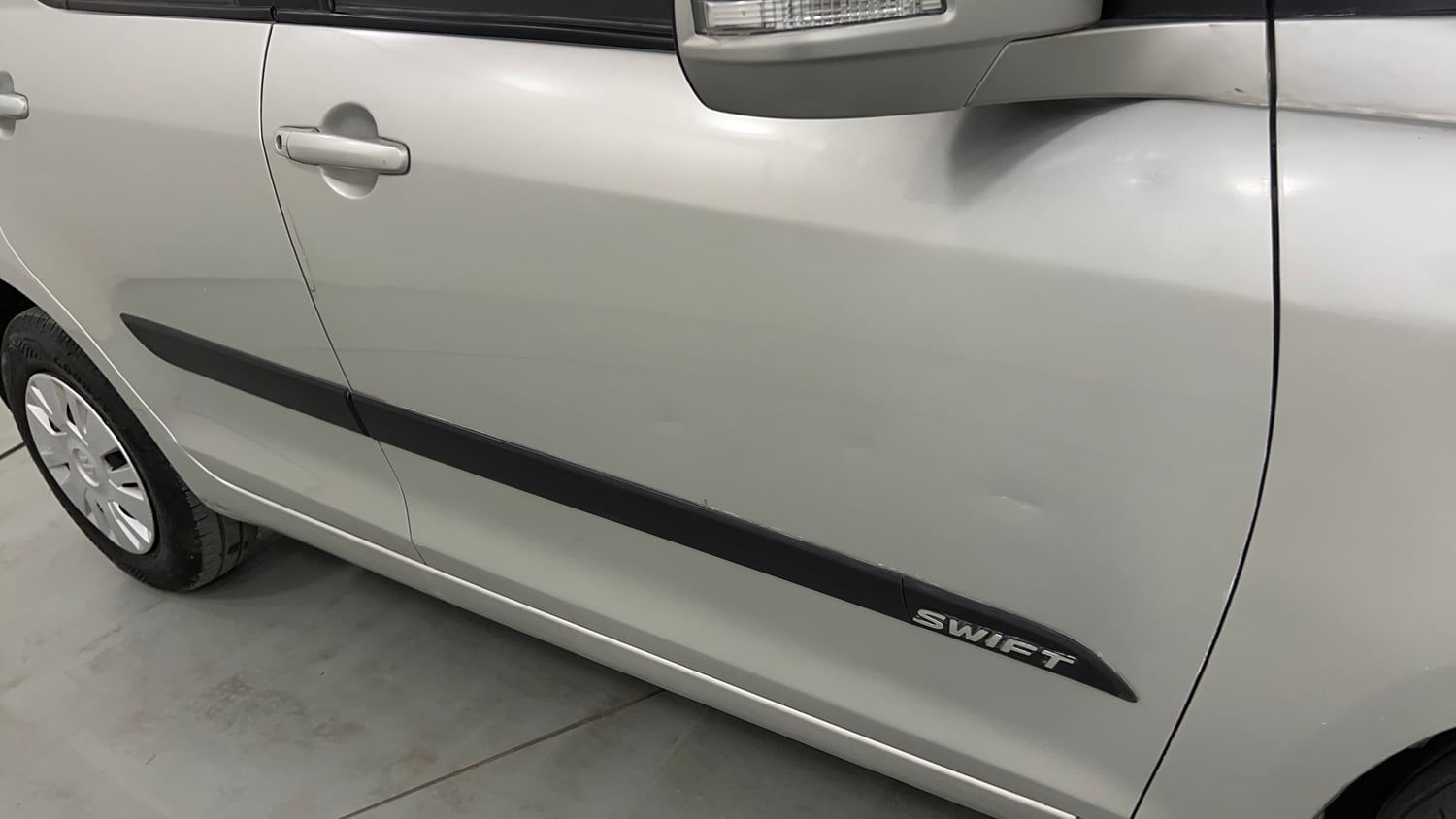Used 2014 Maruti Suzuki Swift VXi Petrol Manual dents MINOR DENT