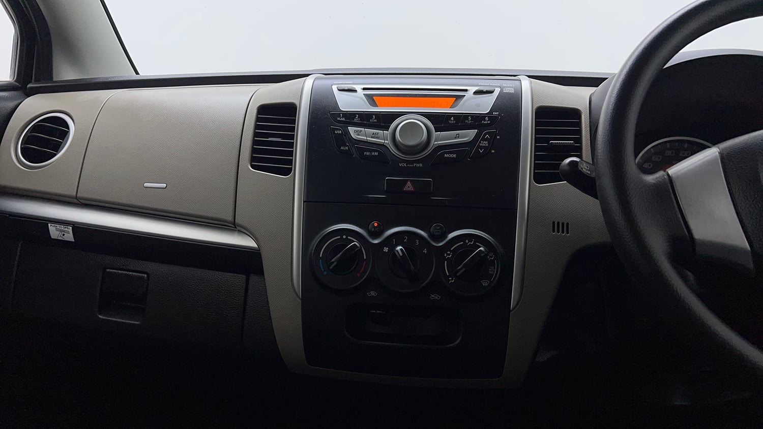 Used 2014 Maruti Suzuki Wagon R VXI Petrol Manual top_features Integrated (in-dash) music system