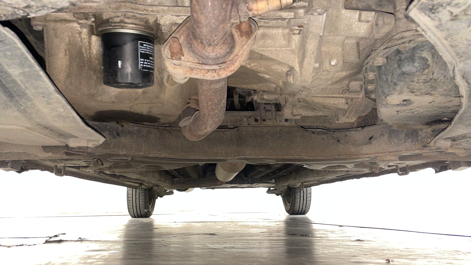 Used 2016 Maruti Suzuki Ertiga VXI AT Petrol Automatic extra FRONT LEFT UNDERBODY VIEW