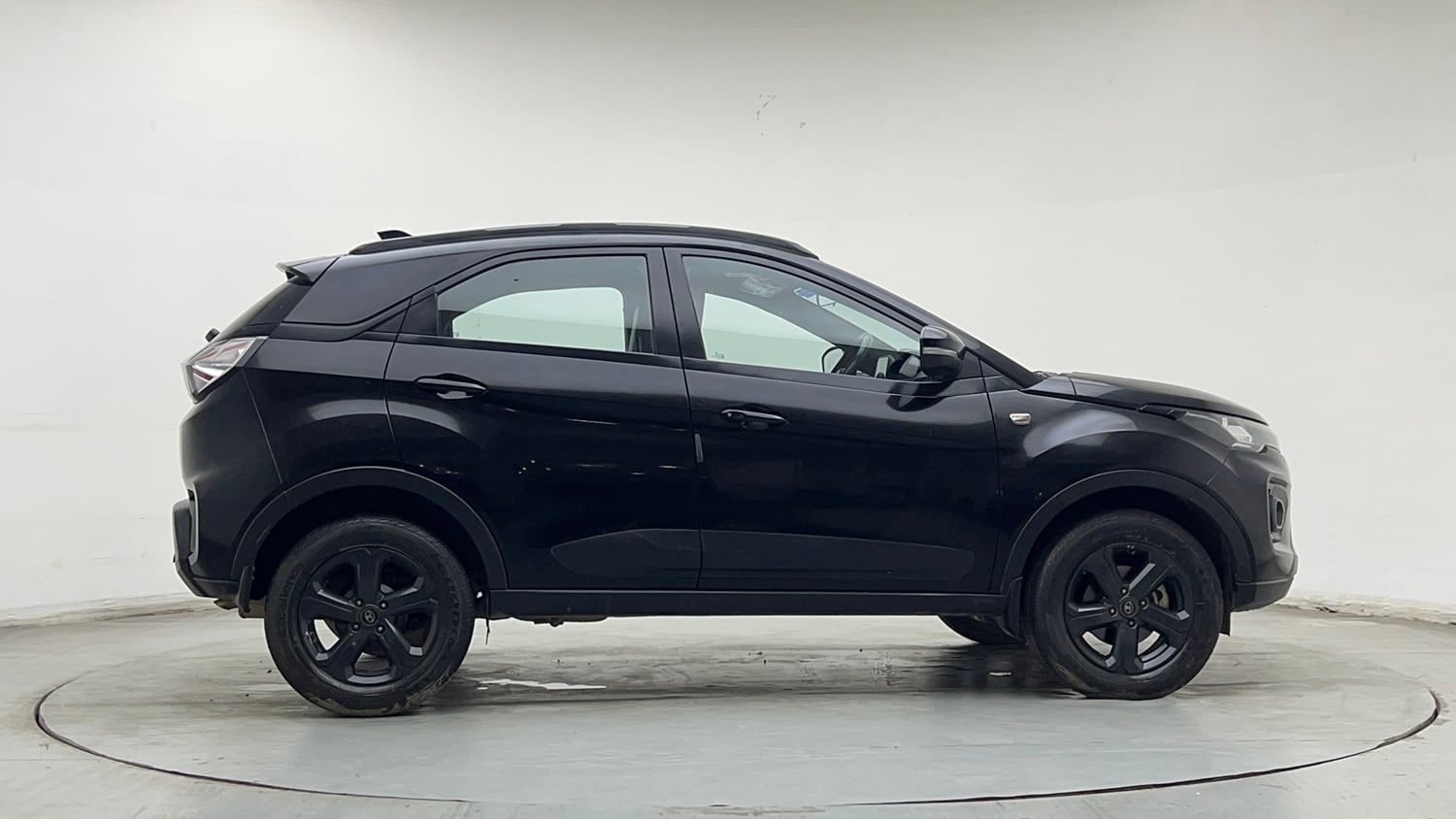 Used 2023 Tata Nexon XZ Plus (S) Dark Edition Petrol Manual exterior RIGHT SIDE VIEW