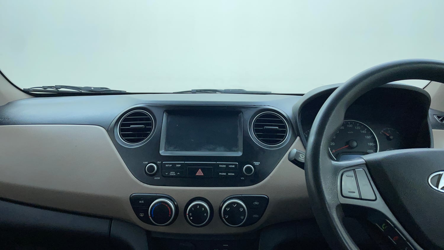 Used 2017 Hyundai Grand i10 Sportz (O) 1.2 Kappa VTVT Petrol Manual interior MUSIC SYSTEM & AC CONTROL VIEW