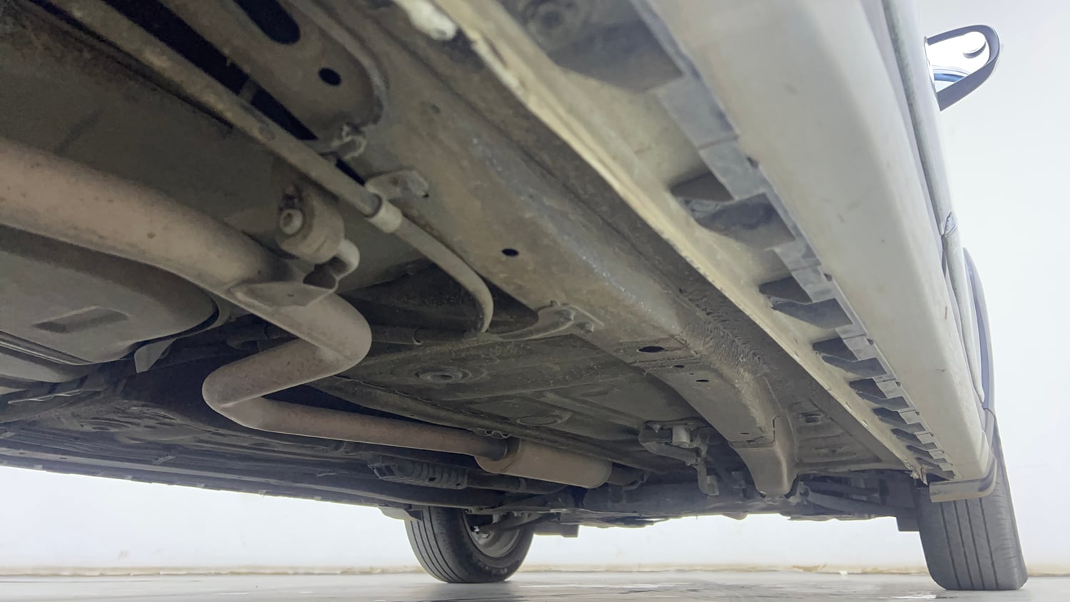 Used 2024 Maruti Suzuki XL6 Zeta MT Petrol Petrol Manual extra REAR RIGHT UNDERBODY VIEW