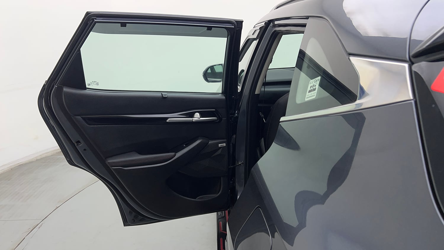 Used 2023 Kia Seltos GTX Plus 1.4 Petrol Manual interior LEFT REAR DOOR OPEN VIEW