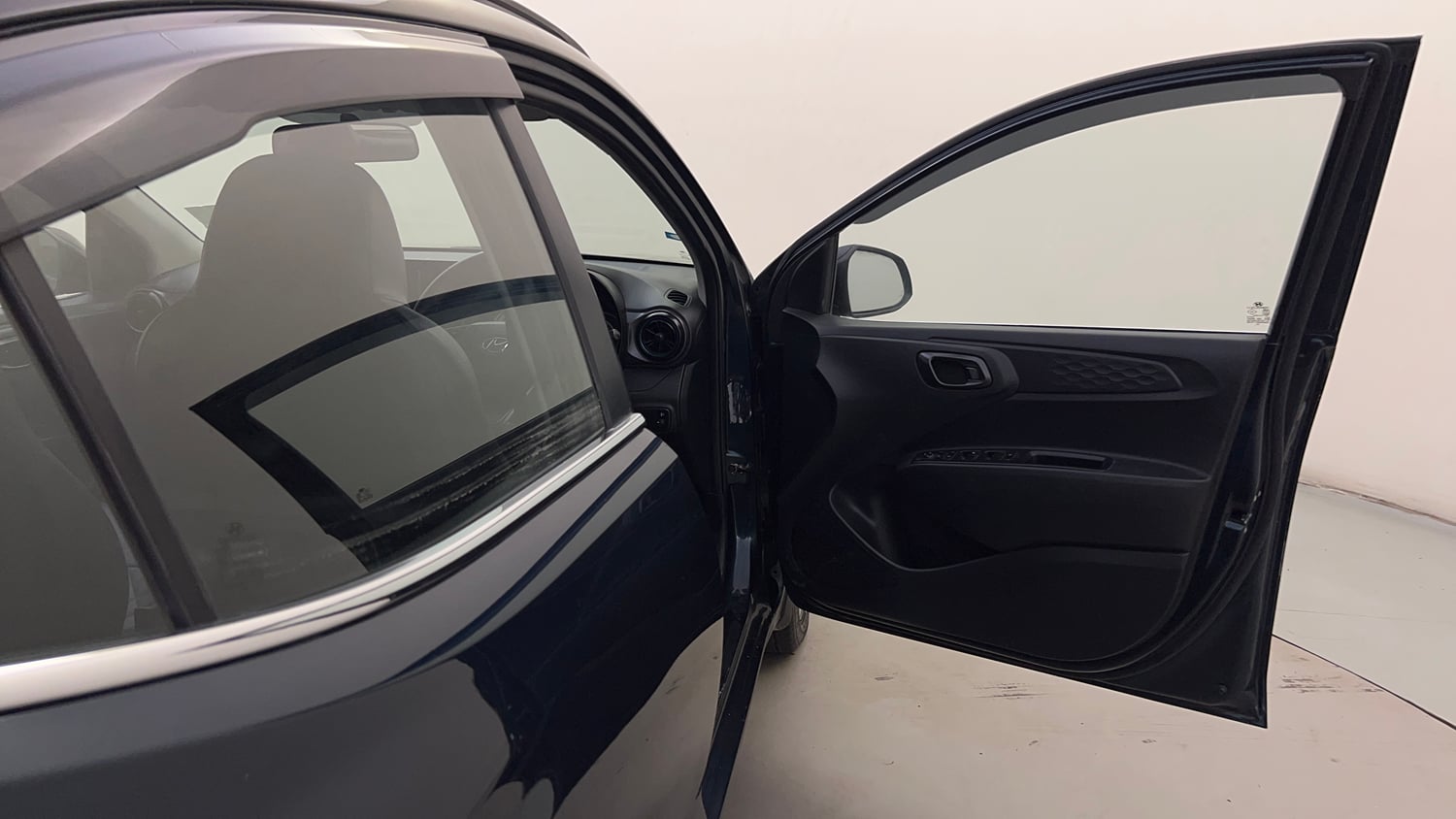 Used 2021 Hyundai Grand i10 Nios Sportz 1.2 Kappa VTVT Dual Tone Petrol Manual interior RIGHT FRONT DOOR OPEN VIEW