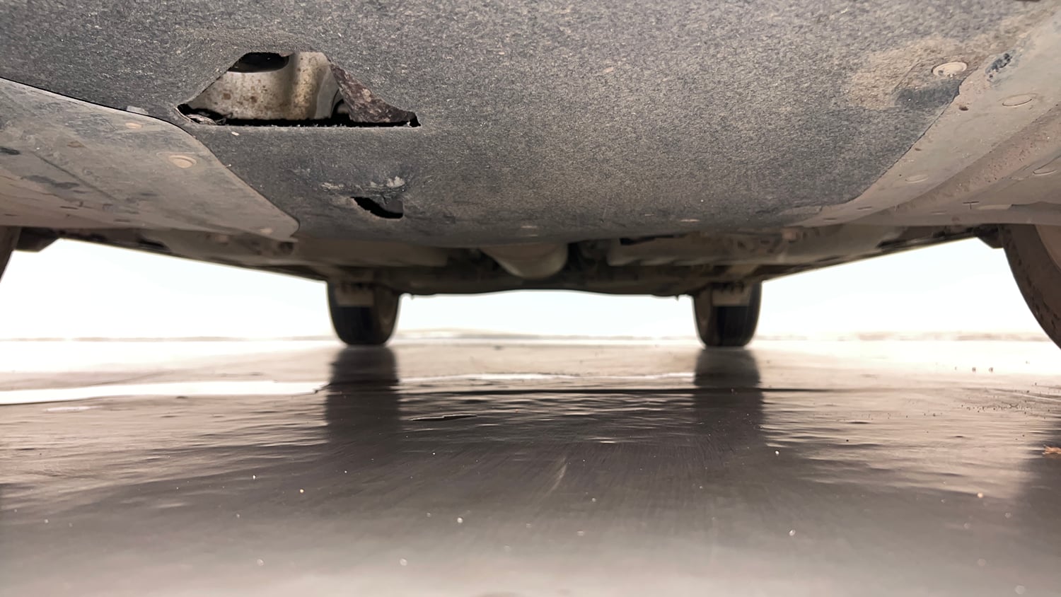Used 2024 Maruti Suzuki Fronx Alpha 1.0L Turbo 6 AT Petrol Automatic extra FRONT LEFT UNDERBODY VIEW