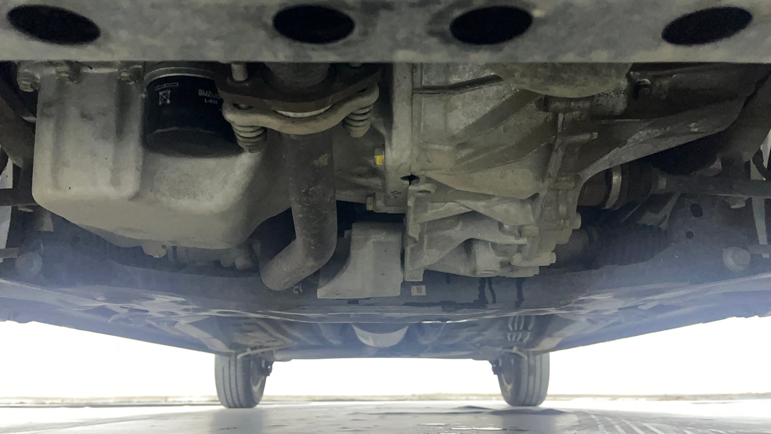 Used 2024 Maruti Suzuki Celerio ZXi Plus AMT Petrol Automatic extra FRONT LEFT UNDERBODY VIEW