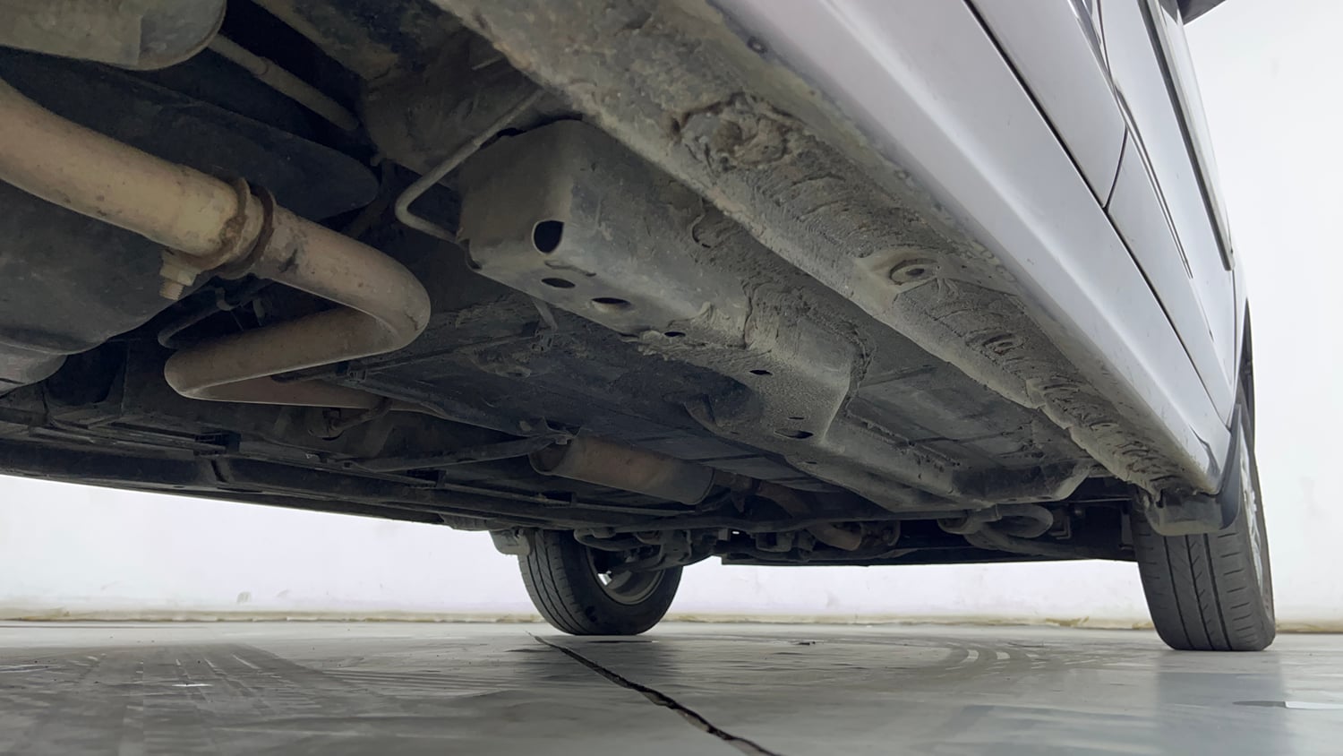 Used 2018 Tata Tiago Revotron XZ Petrol Manual extra REAR RIGHT UNDERBODY VIEW