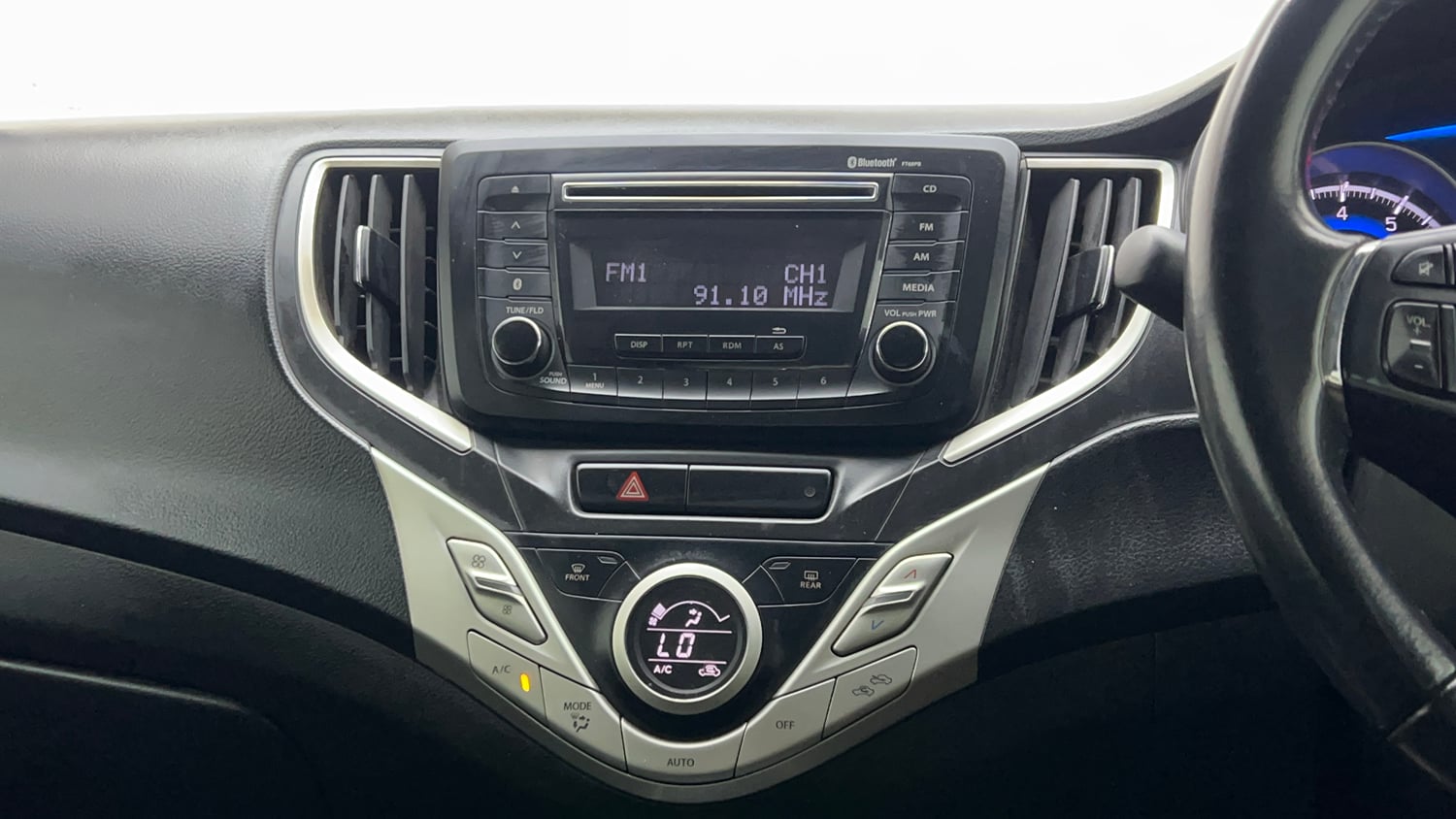 Used 2016 Maruti Suzuki Baleno Zeta 1.2 Petrol Manual interior MUSIC SYSTEM & AC CONTROL VIEW