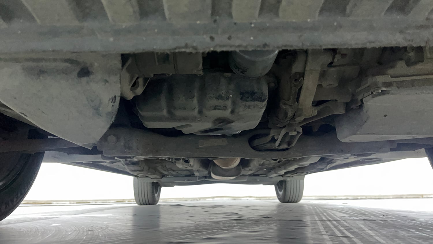 Used 2023 Volkswagen Virtus Topline 1.0 TSI AT Petrol Automatic extra FRONT LEFT UNDERBODY VIEW