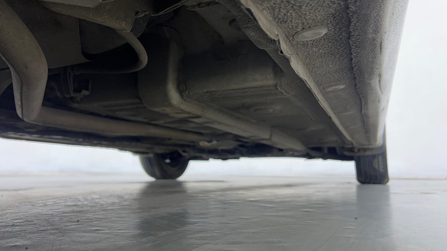 Used 2014 Hyundai Xcent S 1.2 Petrol Manual extra REAR RIGHT UNDERBODY VIEW