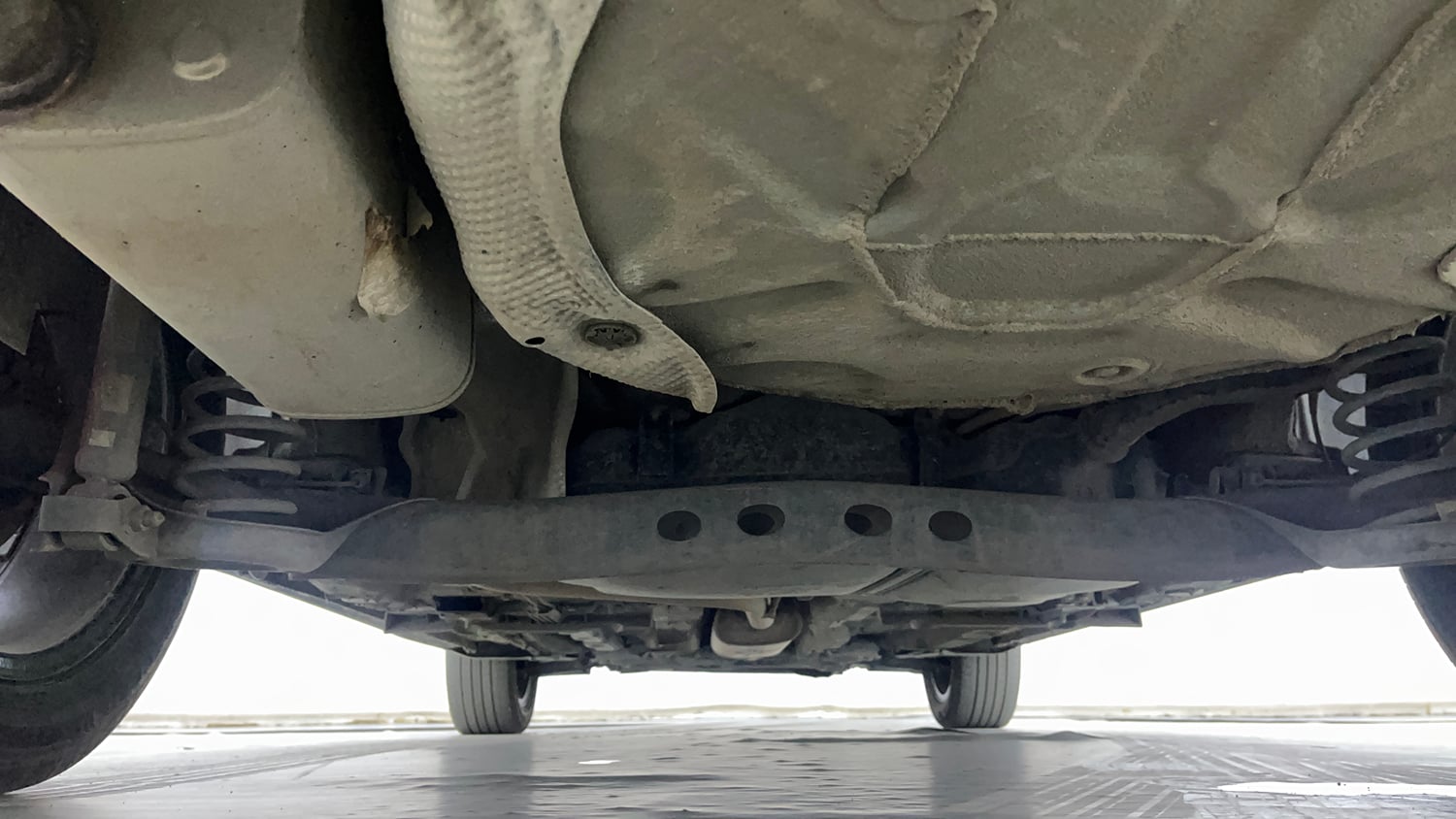 Used 2023 Volkswagen Virtus Topline 1.0 TSI AT Petrol Automatic extra REAR UNDERBODY VIEW (TAKEN FROM REAR)