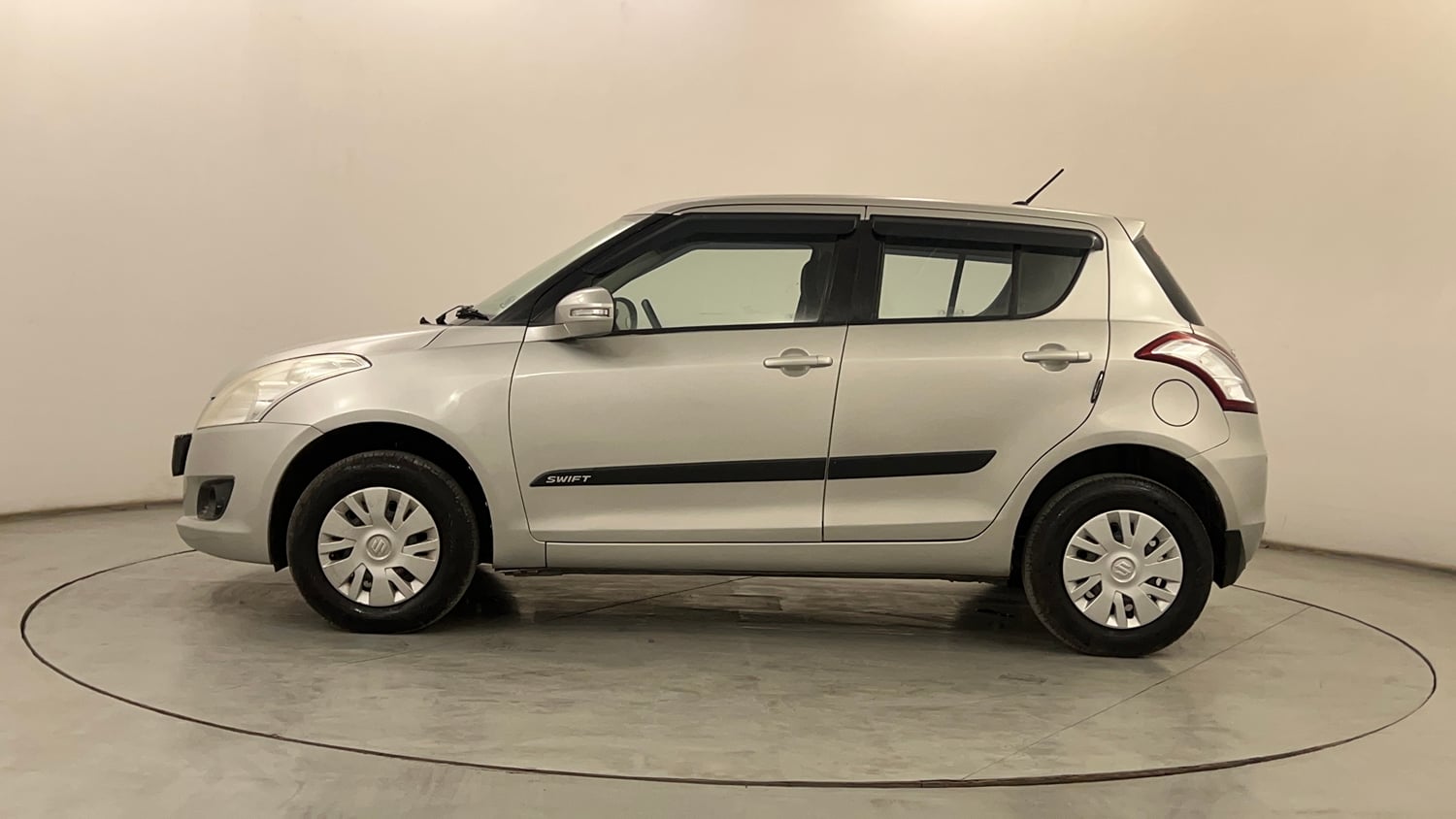 Used 2014 Maruti Suzuki Swift VXi Petrol Manual exterior LEFT SIDE VIEW