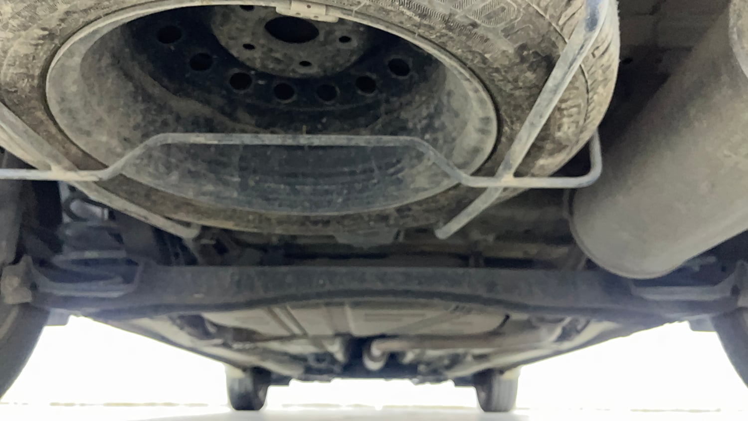 Used 2023 Maruti Suzuki Ertiga ZXi Plus AT Petrol Automatic extra REAR UNDERBODY VIEW (TAKEN FROM REAR)