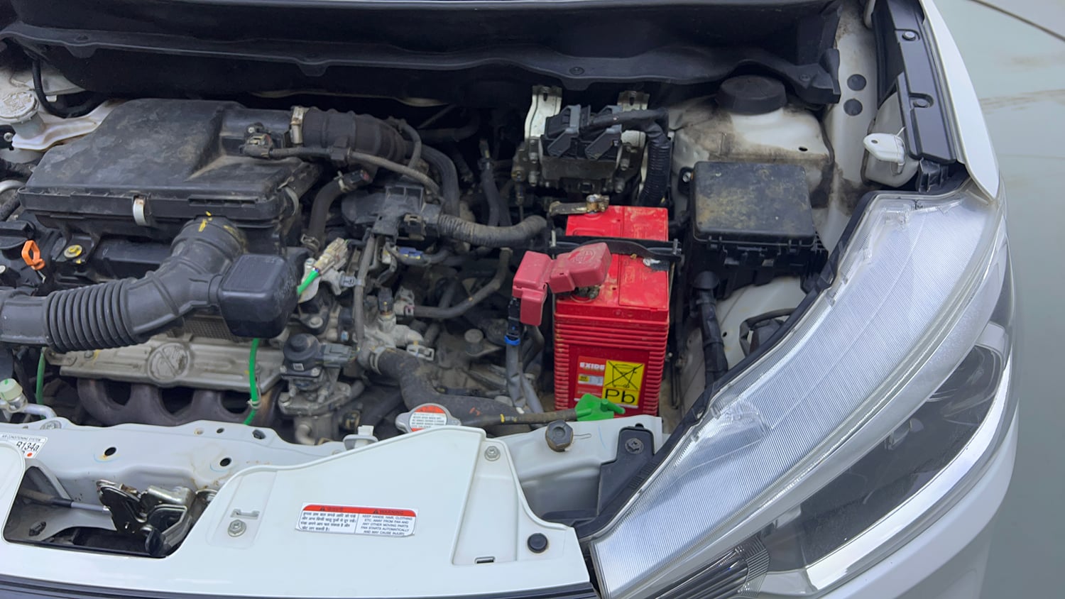 Used 2023 Maruti Suzuki Ertiga ZXi (O) CNG Cng Manual engine ENGINE LEFT SIDE VIEW
