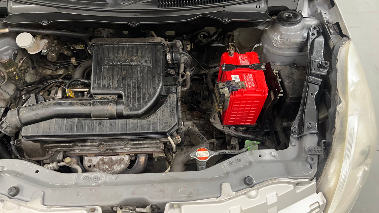 Used 2014 Maruti Suzuki Swift VXi Petrol Manual engine ENGINE LEFT SIDE VIEW