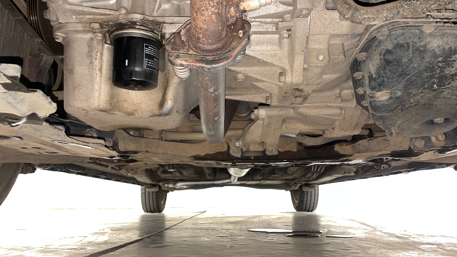 Used 2019 Maruti Suzuki XL6 Alpha AT Petrol Petrol Automatic extra FRONT LEFT UNDERBODY VIEW