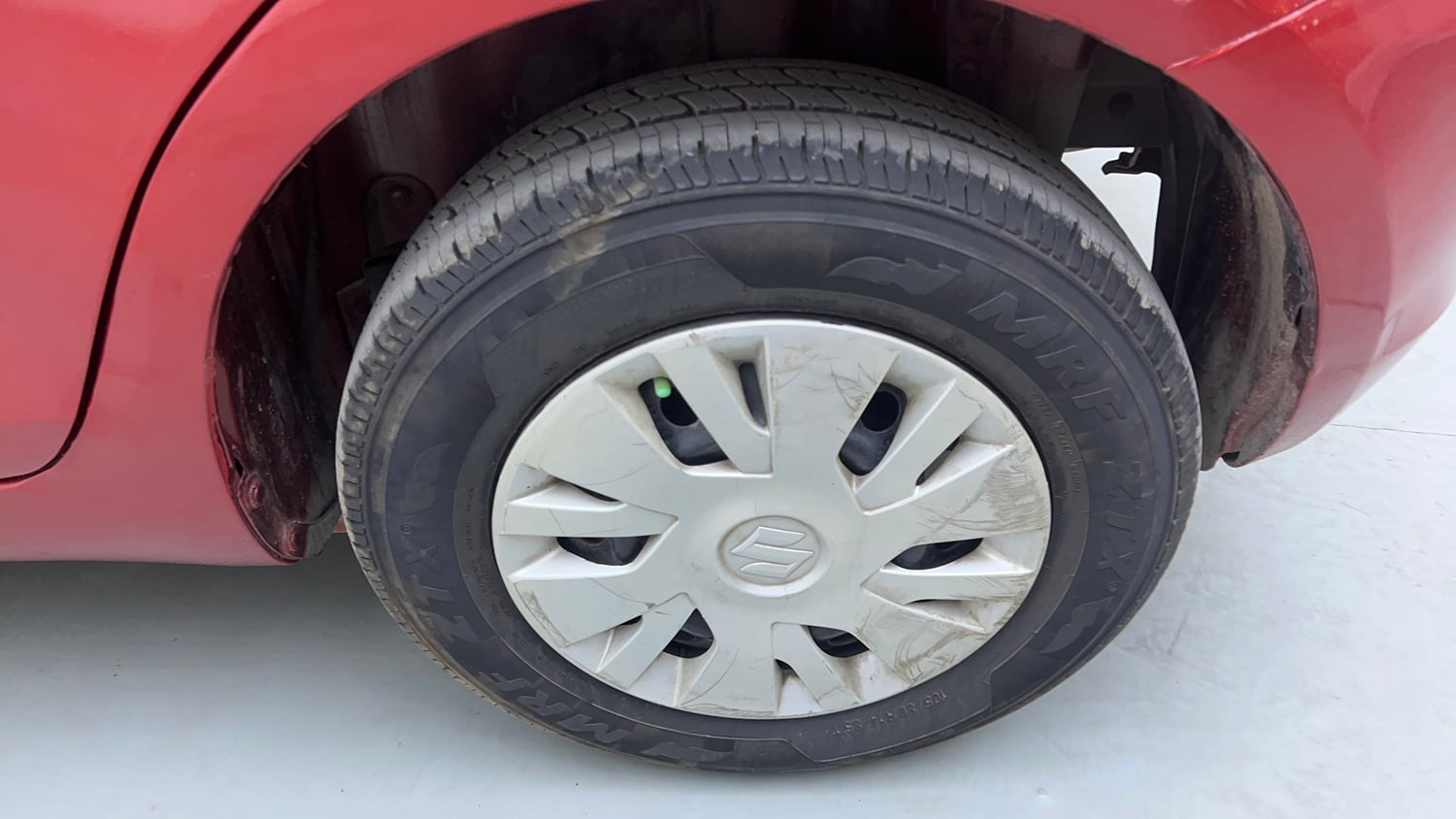Used 2014 Maruti Suzuki Swift VXi Petrol Manual tyres LEFT REAR TYRE RIM VIEW