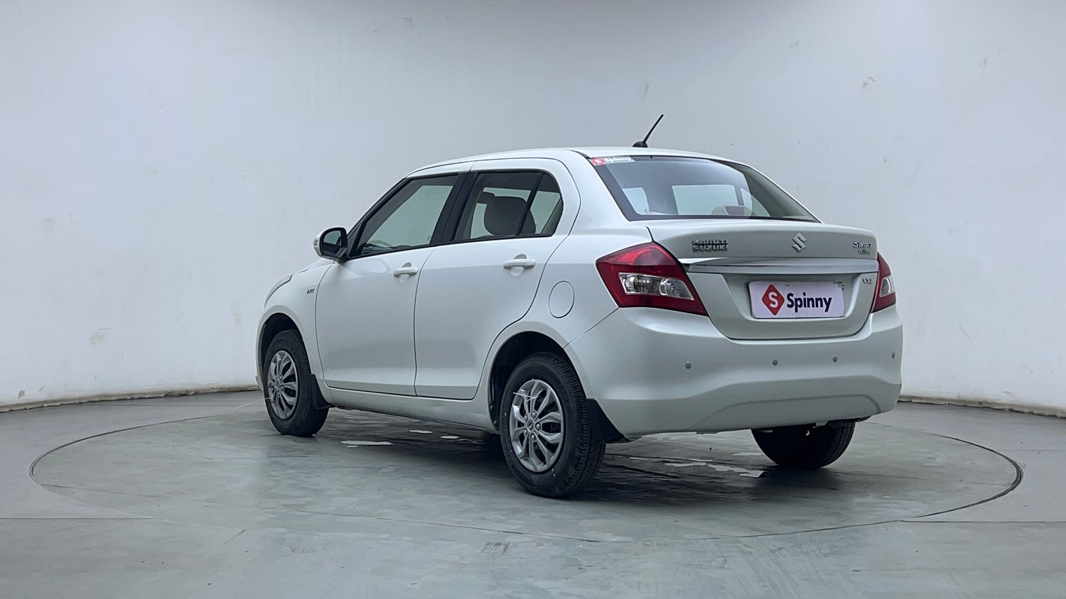 Used 2015 Maruti Suzuki Swift Dzire VXI Petrol Manual exterior LEFT REAR CORNER VIEW