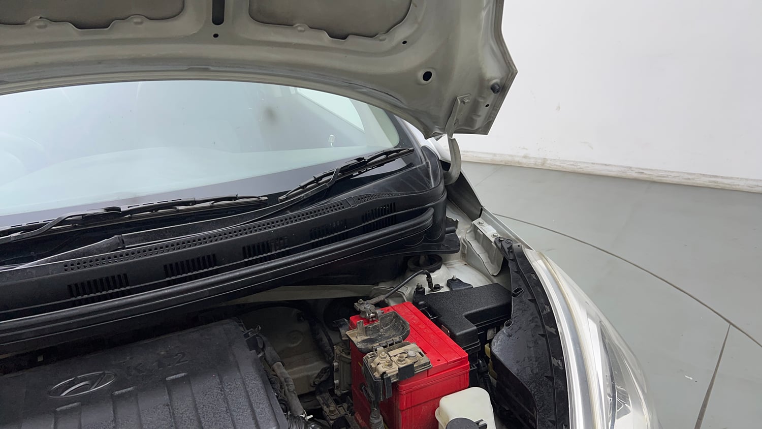 Used 2015 Hyundai Grand i10 Sportz 1.2 Kappa VTVT Petrol Manual engine ENGINE LEFT SIDE HINGE & APRON VIEW