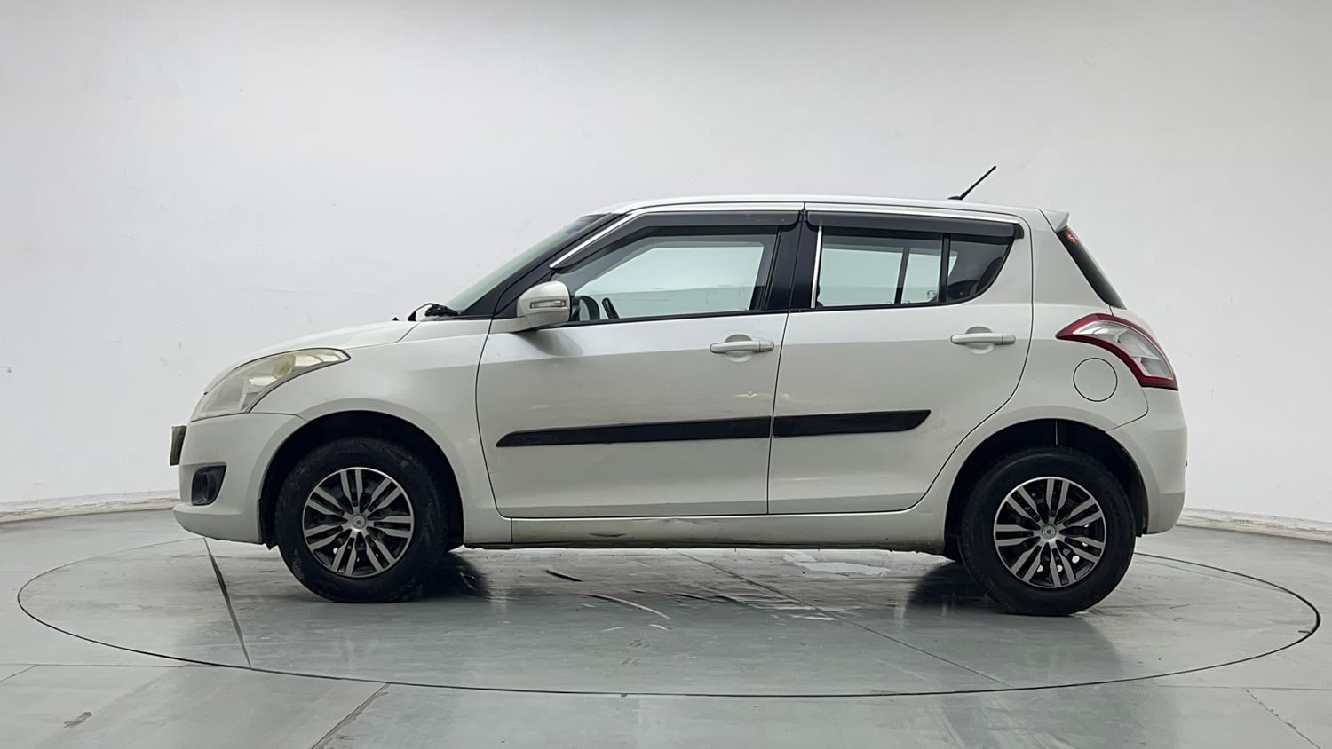 Used 2013 Maruti Suzuki Swift VXI CNG (Outside Fitted) Cng Manual exterior LEFT SIDE VIEW
