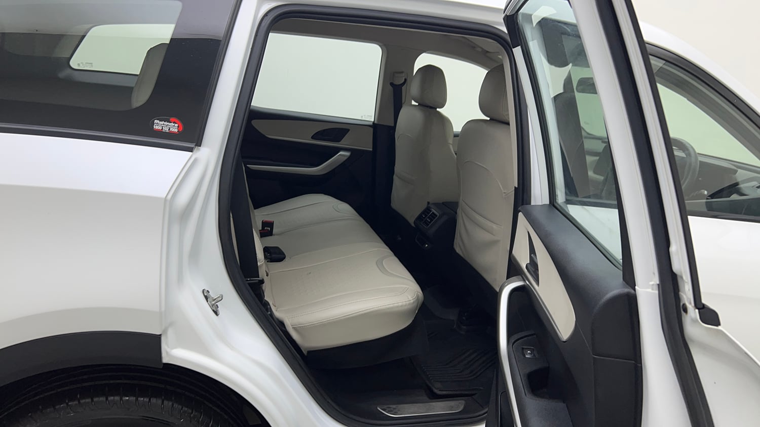 Used 2022 Mahindra XUV700 MX Petrol MT 5 STR Petrol Manual interior RIGHT SIDE REAR DOOR CABIN VIEW