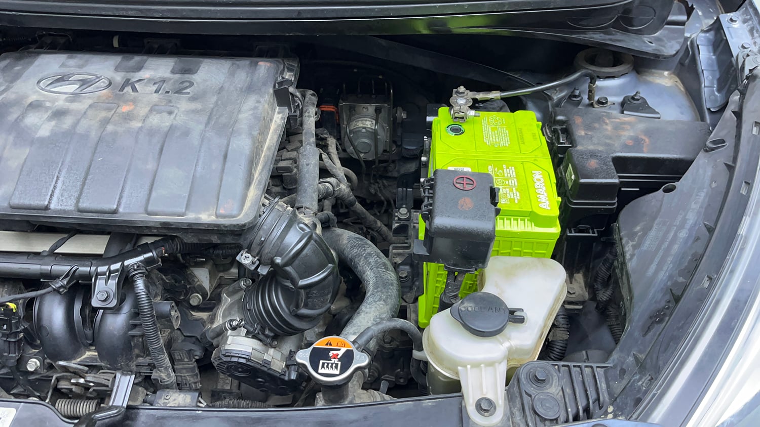 Used 2014 Hyundai Xcent SX 1.2 (O) Petrol Manual engine ENGINE LEFT SIDE VIEW