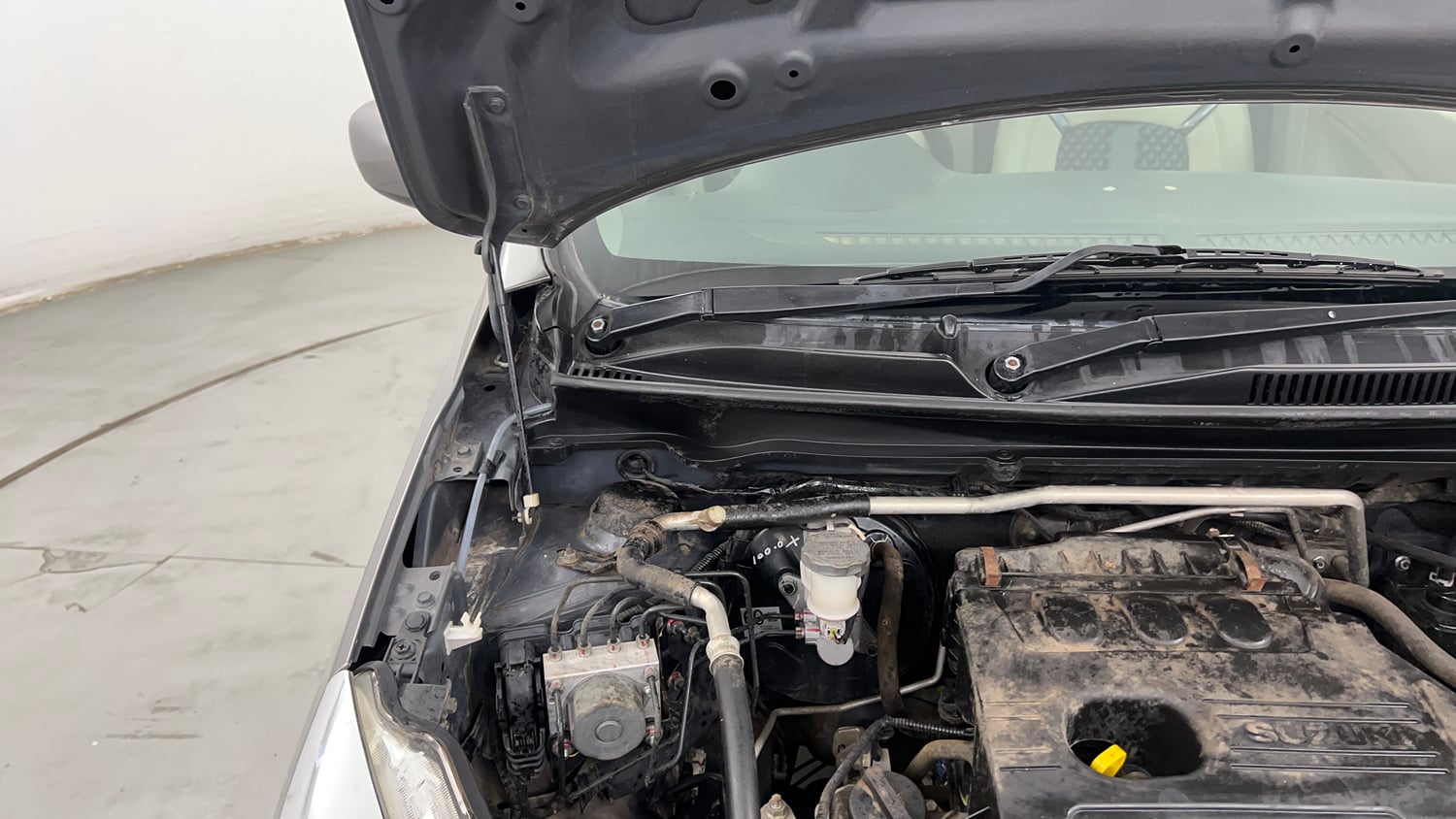 Used 2018 Maruti Suzuki Celerio VXi (O) CNG Cng Manual engine ENGINE RIGHT SIDE HINGE & APRON VIEW