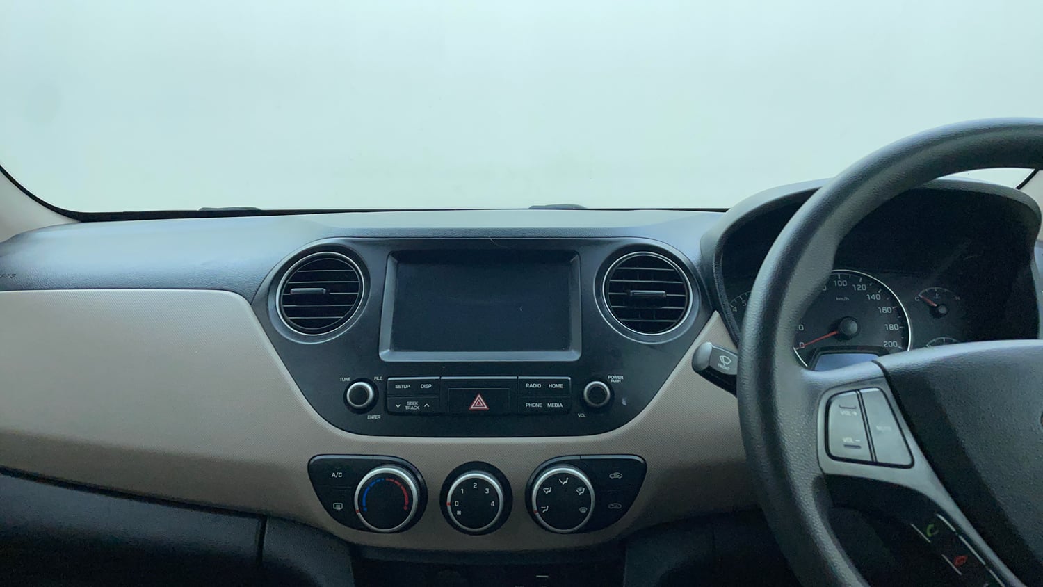 Used 2017 Hyundai Grand i10 Sportz 1.2 Kappa VTVT Petrol Manual interior MUSIC SYSTEM & AC CONTROL VIEW