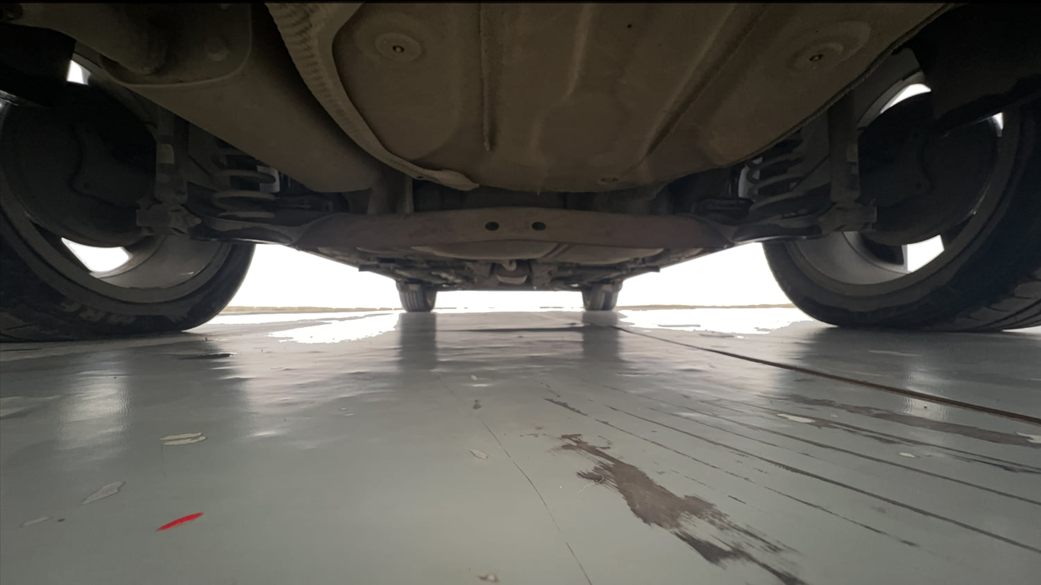 Used 2023 Volkswagen Taigun Topline 1.0 TSI MT Petrol Manual extra REAR UNDERBODY VIEW (TAKEN FROM REAR)
