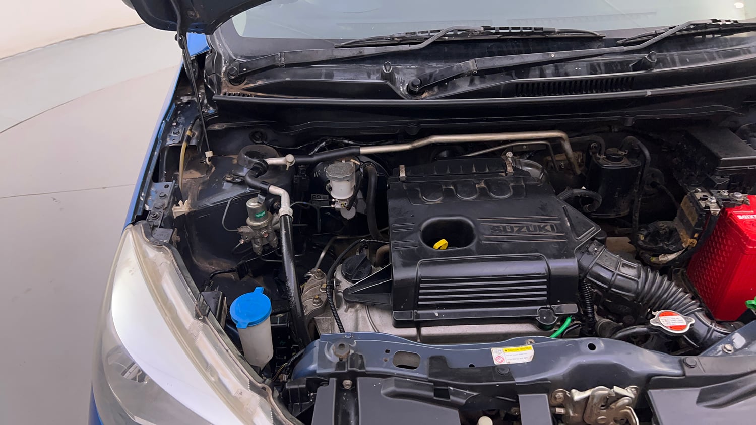 Used 2016 Maruti Suzuki Celerio VXi AMT Petrol Automatic engine ENGINE RIGHT SIDE HINGE & APRON VIEW