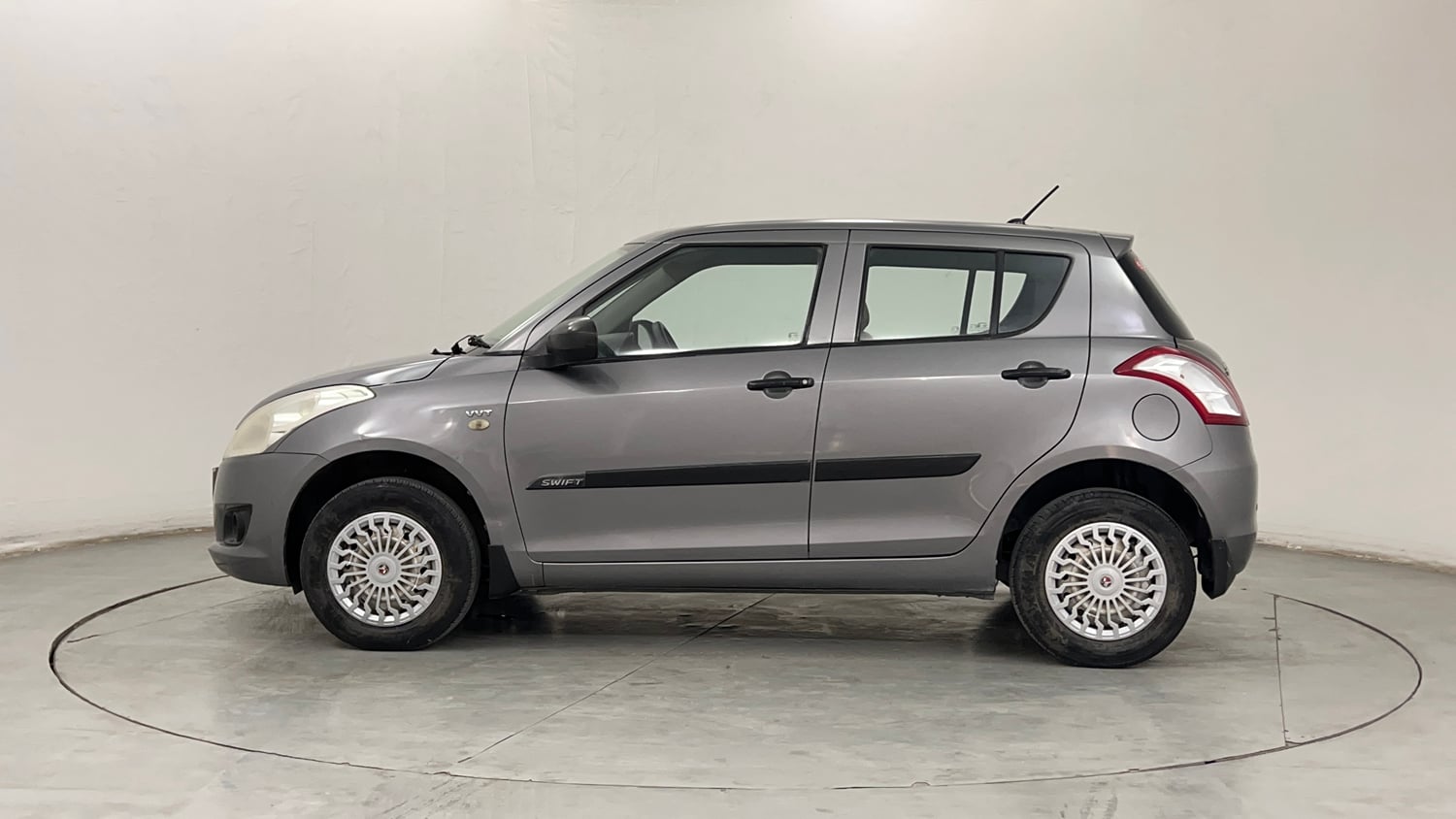Used 2014 Maruti Suzuki Swift LXi Petrol Manual exterior LEFT SIDE VIEW