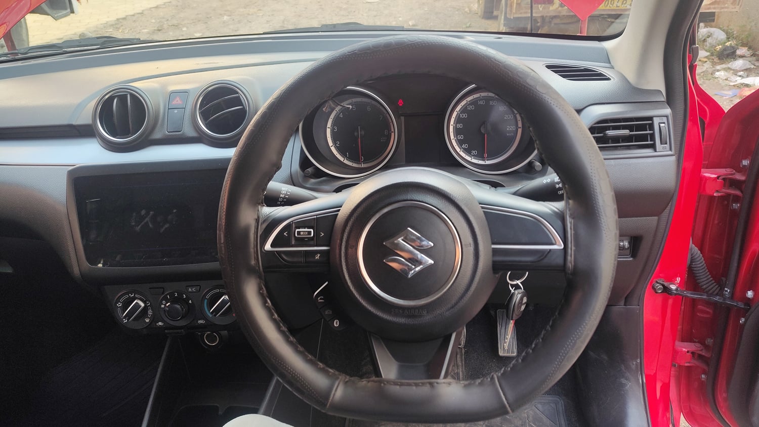 Used 2022 Maruti Suzuki Swift VXi Petrol Manual top_features Steering mounted controls