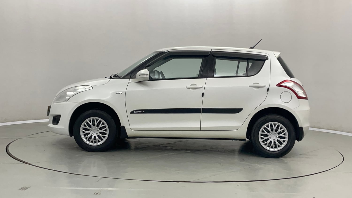 Used 2013 Maruti Suzuki Swift VXi Petrol Manual exterior LEFT SIDE VIEW