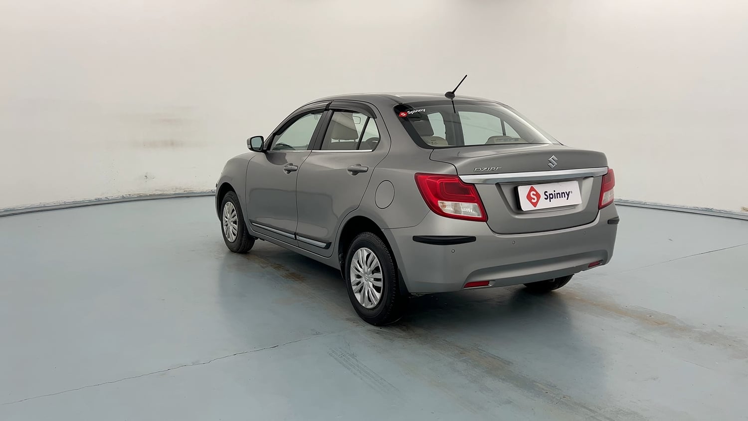 Used 2021 Maruti Suzuki Dzire VXi Petrol Manual exterior LEFT REAR CORNER VIEW