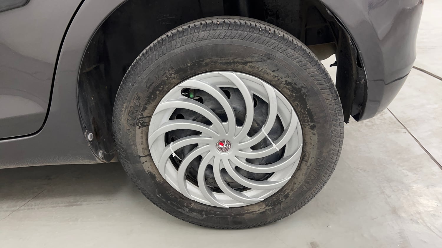 Used 2018 Maruti Suzuki Swift VXI (O) Petrol Manual tyres LEFT REAR TYRE RIM VIEW