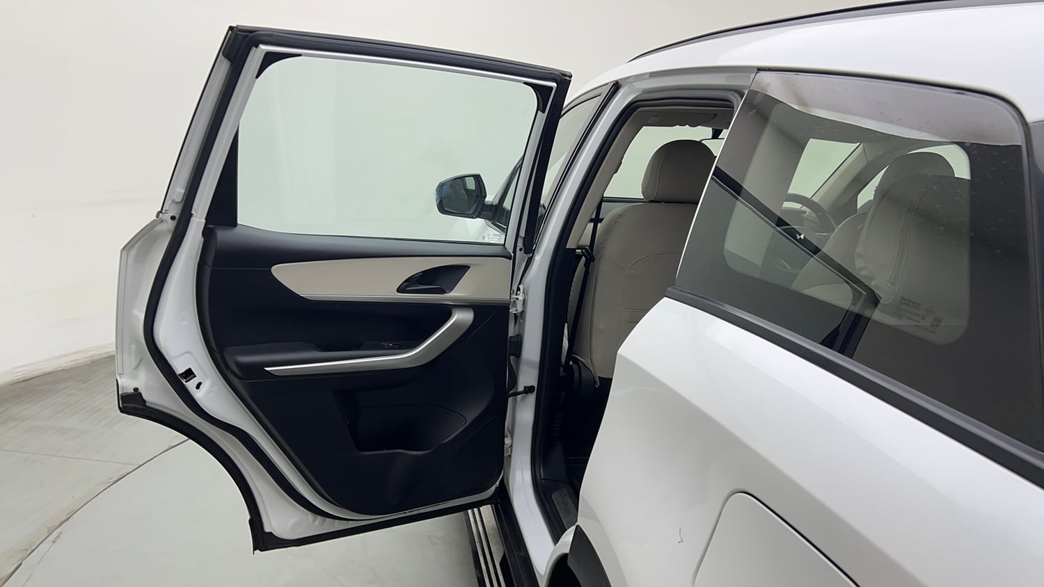 Used 2022 Mahindra XUV700 MX Petrol MT 5 STR Petrol Manual interior LEFT REAR DOOR OPEN VIEW